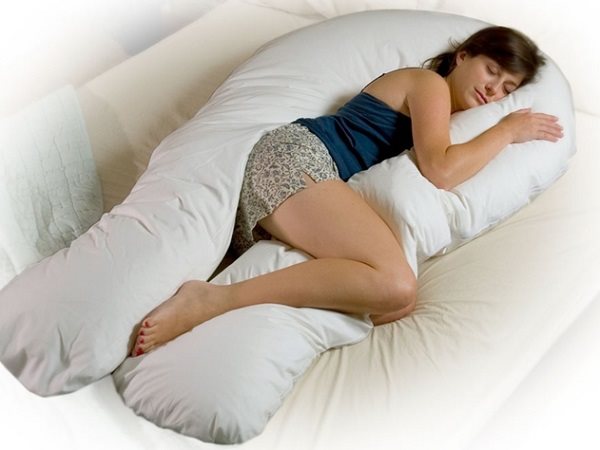 Pregnant Woman Sleeping on Pregnancy Pillow pictures, images, photos, wallpaper